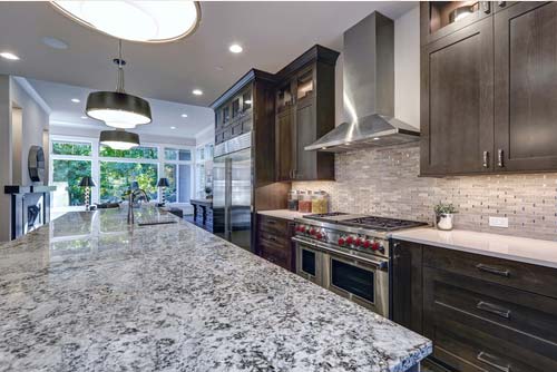 Granite kitchen countertop installation by Top It Marble and Granite