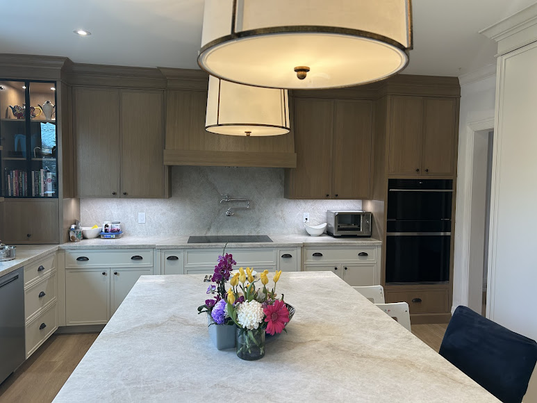 Clean quartz kitchen island that looks consistent and easy to wipe down